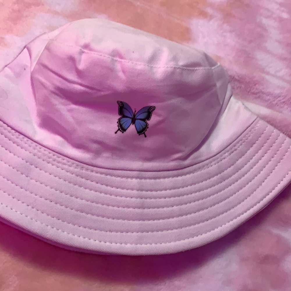 Small/ medium white bucket hat! Cute butterfly on the front:)